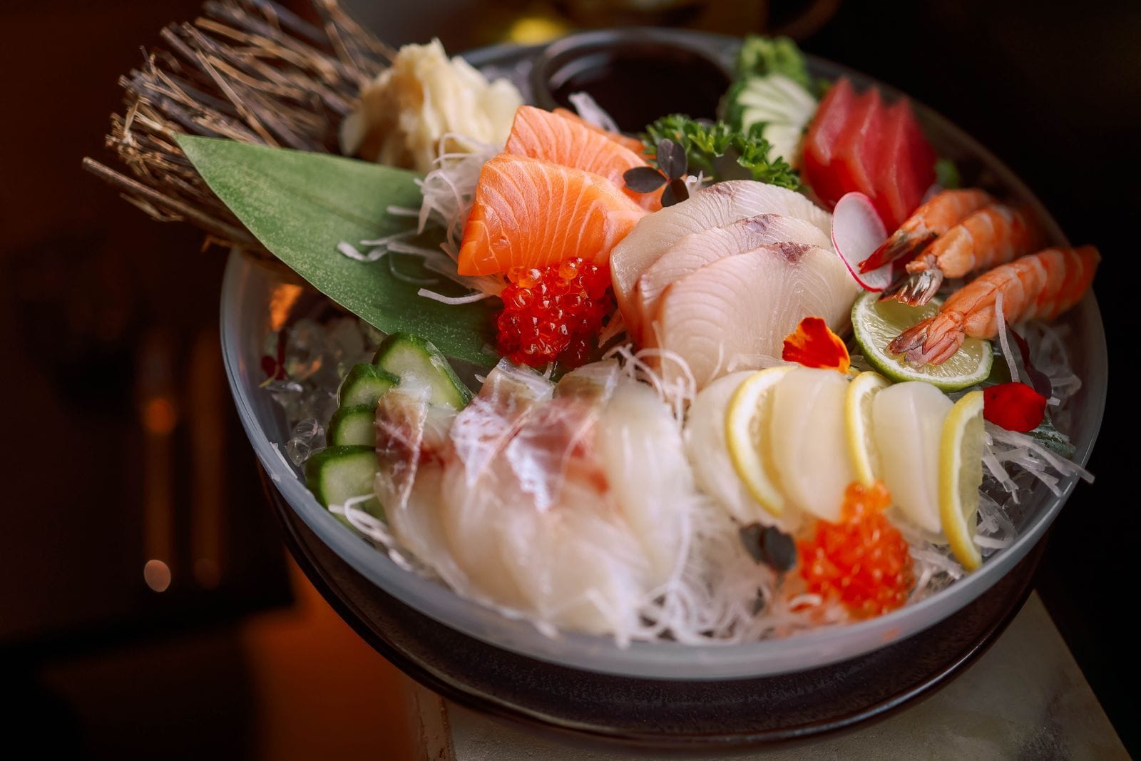 Fresh sashimi arranged with seafood and vegetables