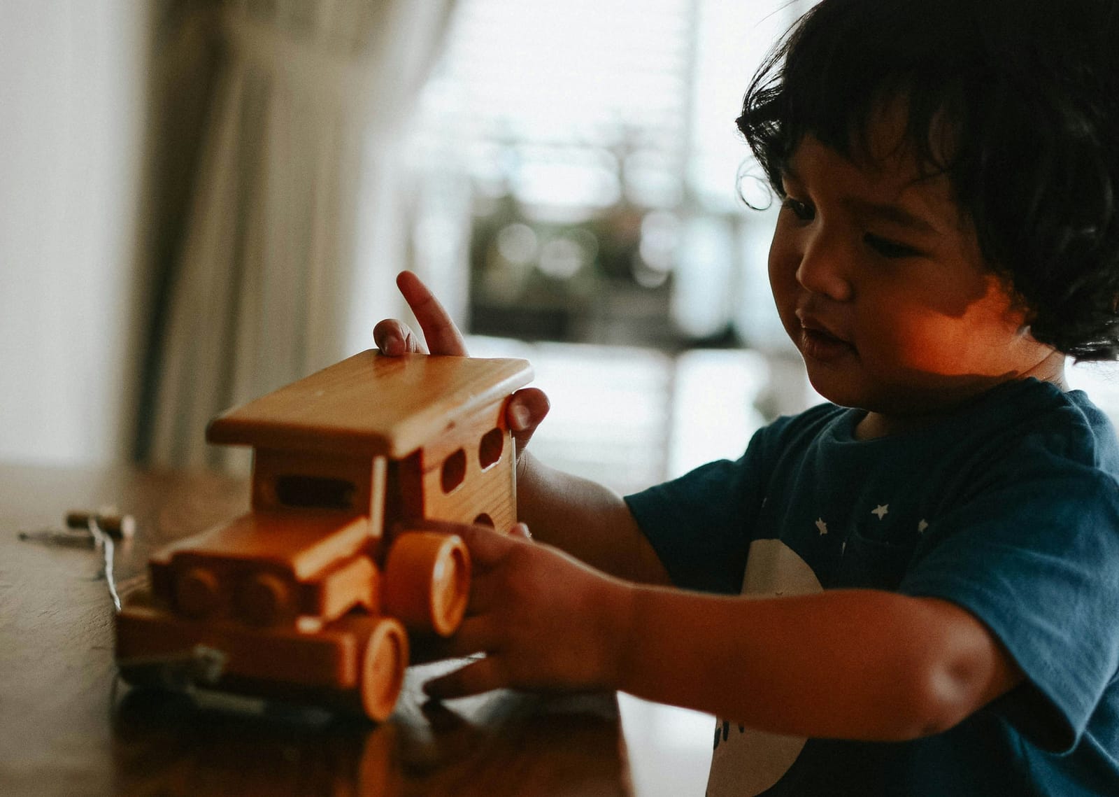 Child engaged in a natural play activity